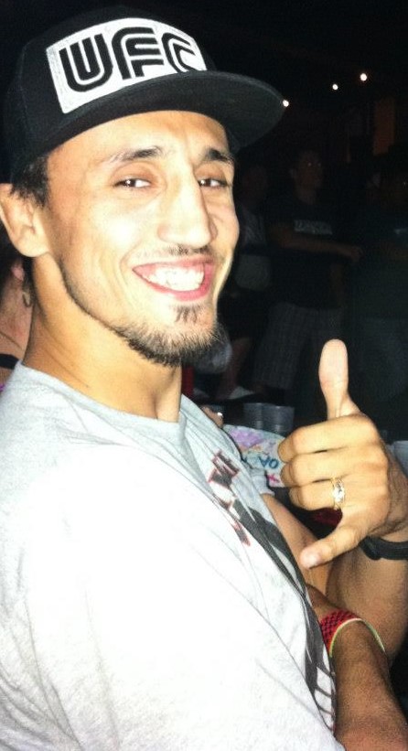 Cartoon of boy sitting in chair with laptop